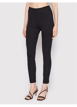 DKNY Legginsy P0RK8CMD Czarny Slim Fit ze sklepu MODIVO w kategorii Spodnie damskie - zdjęcie 182733759