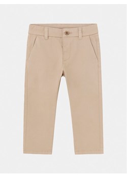 Mayoral Chinosy 522 Beżowy Slim Fit ze sklepu MODIVO w kategorii Spodnie i półśpiochy - zdjęcie 182733897