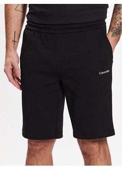 Calvin Klein Szorty sportowe Micro Logo K10K111208 Czarny Regular Fit ze sklepu MODIVO w kategorii Spodenki męskie - zdjęcie 182734305