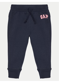 Gap Spodnie dresowe 688170-03 Granatowy Regular Fit ze sklepu MODIVO w kategorii Spodnie chłopięce - zdjęcie 182734337