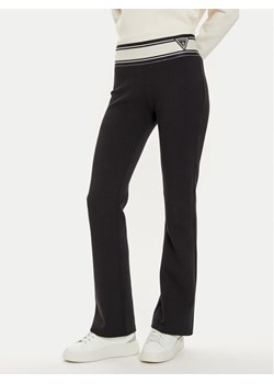 Guess Spodnie palazzo Ann V3BB09 KBCK2 Czarny Regular Fit ze sklepu MODIVO w kategorii Spodnie damskie - zdjęcie 182734957