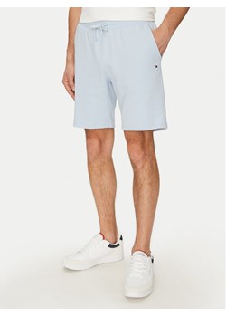 Tommy Hilfiger Szorty materiałowe Essential Terry Sweatshort MW0MW37240 Błękitny Regular Fit ze sklepu MODIVO w kategorii Spodenki męskie - zdjęcie 182735206