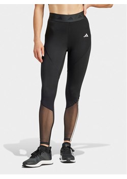 adidas Legginsy Hyperglam IN9298 Czarny Slim Fit ze sklepu MODIVO w kategorii Spodnie damskie - zdjęcie 182735686