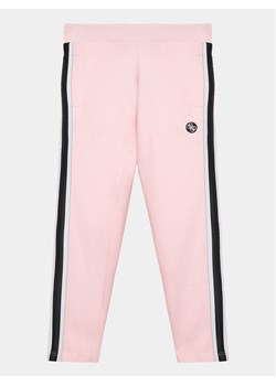 Guess Spodnie dresowe J3YQ13 KA6R3 Różowy Relaxed Fit ze sklepu MODIVO w kategorii Spodnie dziewczęce - zdjęcie 182736737