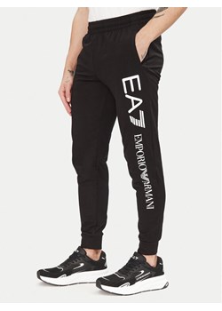 EA7 Emporio Armani Spodnie dresowe 7M000571 AF13512 MC001 Czarny Regular Fit ze sklepu MODIVO w kategorii Spodnie męskie - zdjęcie 182737097