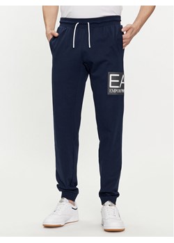 EA7 Emporio Armani Spodnie dresowe 3DPP73 PJ05Z 1554 Granatowy Regular Fit ze sklepu MODIVO w kategorii Spodnie męskie - zdjęcie 182737756