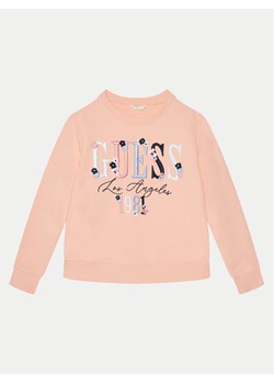 Guess Bluza J5RQ05 KAD74 Różowy Regular Fit ze sklepu MODIVO w kategorii Bluzy dziewczęce - zdjęcie 182738176