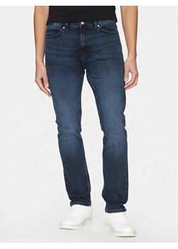 HUGO Jeansy 50530610 Niebieski Slim Fit ze sklepu MODIVO w kategorii Jeansy męskie - zdjęcie 182738906
