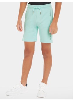 Calvin Klein Jeans Szorty sportowe Minimalistic IB0IB02061 Niebieski Regular Fit ze sklepu MODIVO w kategorii Spodenki chłopięce - zdjęcie 182739616