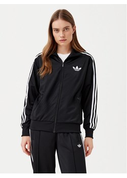 adidas Bluza adicolor Classic Firebird JC8251 Czarny Loose Fit ze sklepu MODIVO w kategorii Bluzy damskie - zdjęcie 182740125