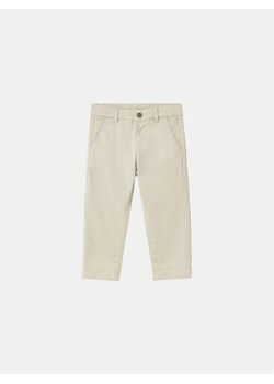 Mayoral Chinosy 522 Beżowy Slim Fit ze sklepu MODIVO w kategorii Spodnie i półśpiochy - zdjęcie 182740908