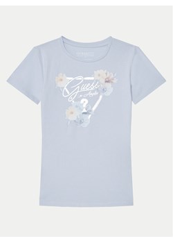 Guess T-Shirt J5RI22 K6YW4 Błękitny Regular Fit ze sklepu MODIVO w kategorii Bluzki dziewczęce - zdjęcie 182741696