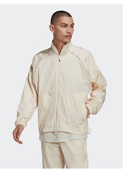 adidas Bluza Reveal Material Mix HK2729 Beżowy Regular Fit ze sklepu MODIVO w kategorii Bluzy męskie - zdjęcie 182742516