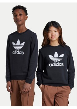 adidas Bluza Trefoil IY7435 Czarny Regular Fit ze sklepu MODIVO w kategorii Bluzy chłopięce - zdjęcie 182742719