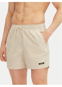 Calvin Klein Swimwear Szorty kąpielowe KM0KM01120 Beżowy Regular Fit ze sklepu MODIVO w kategorii Kąpielówki - zdjęcie 182742779