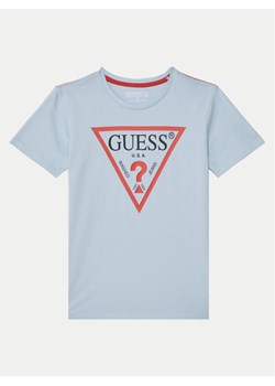 Guess T-Shirt L73I55 K8HM0 Błękitny Regular Fit ze sklepu MODIVO w kategorii T-shirty chłopięce - zdjęcie 182742858