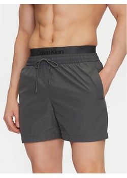 Calvin Klein Swimwear Szorty kąpielowe KM0KM01104 Szary Regular Fit ze sklepu MODIVO w kategorii Kąpielówki - zdjęcie 182744177