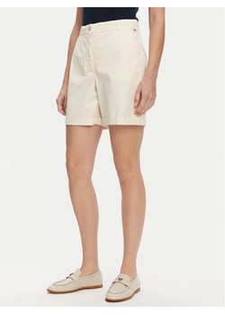 Tommy Hilfiger Szorty materiałowe WW0WW42457 Écru Regular Fit ze sklepu MODIVO w kategorii Szorty - zdjęcie 182744196