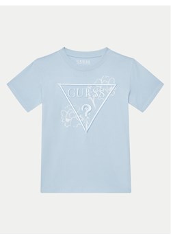 Guess T-Shirt L5GI09 K8HM4 Błękitny Regular Fit ze sklepu MODIVO w kategorii T-shirty chłopięce - zdjęcie 182744629