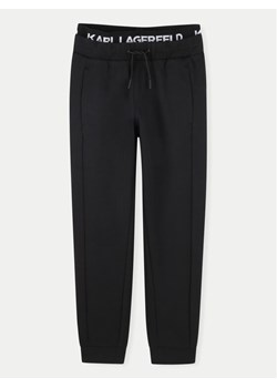 Karl Lagerfeld Kids Spodnie dresowe Z30263 S Czarny Regular Fit ze sklepu MODIVO w kategorii Spodnie chłopięce - zdjęcie 182745689
