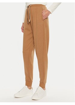 Boss Spodnie dresowe CP Stripe 50524759 Beżowy Regular Fit ze sklepu MODIVO w kategorii Spodnie damskie - zdjęcie 182746368