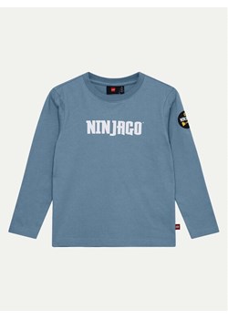 LEGO Bluzka Ninjago 12011275 Niebieski Regular Fit ze sklepu MODIVO w kategorii T-shirty chłopięce - zdjęcie 182746435