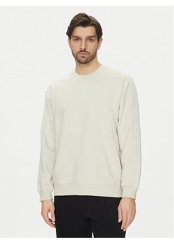 adidas Bluza Premium Essentials JD3304 Beżowy Loose Fit ze sklepu MODIVO w kategorii Bluzy męskie - zdjęcie 182747588