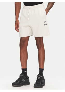 adidas Szorty sportowe Star Wars The Mandalorian™ JI5721 Beżowy Regular Fit ze sklepu MODIVO w kategorii Spodenki męskie - zdjęcie 182748258