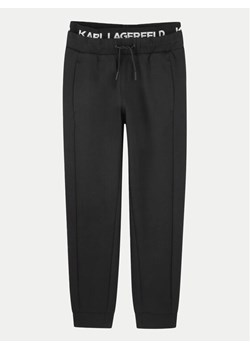 Karl Lagerfeld Kids Spodnie dresowe Z30263 M Czarny Regular Fit ze sklepu MODIVO w kategorii Spodnie chłopięce - zdjęcie 182748705