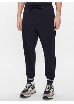Armani Exchange Spodnie dresowe 3DZPL2 ZN3GZ 1583 Granatowy Regular Fit ze sklepu MODIVO w kategorii Spodnie męskie - zdjęcie 182748829