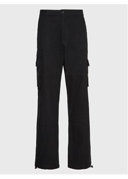 Karl Kani Spodnie materiałowe Rubber Signature 6002507 Czarny Relaxed Fit ze sklepu MODIVO w kategorii Spodnie męskie - zdjęcie 182748846