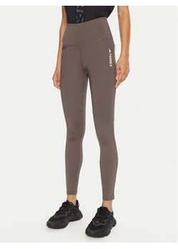 adidas Legginsy Terrex Multi IP6883 Brązowy Slim Fit ze sklepu MODIVO w kategorii Spodnie damskie - zdjęcie 182749278