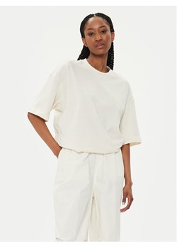 New Balance T-Shirt Hyper Density WT41555 Beżowy Oversize ze sklepu MODIVO w kategorii Bluzki damskie - zdjęcie 182750598