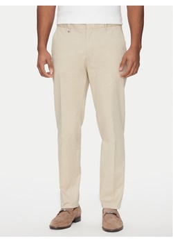BOSS Spodnie materiałowe C-Genius 50534612 Beżowy Slim Fit ze sklepu MODIVO w kategorii Spodnie męskie - zdjęcie 182751185