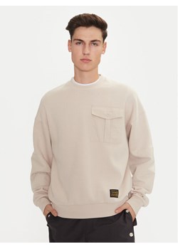 Champion Bluza 220421 Écru Loose Fit ze sklepu MODIVO w kategorii Bluzy męskie - zdjęcie 182752308