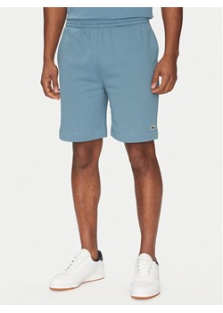 Lacoste Szorty sportowe GH9627 Niebieski Regular Fit ze sklepu MODIVO w kategorii Spodenki męskie - zdjęcie 182755076