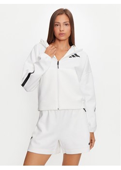 adidas Bluza Z.N.E. JE7849 Biały Loose Fit ze sklepu MODIVO w kategorii Bluzy damskie - zdjęcie 182755415