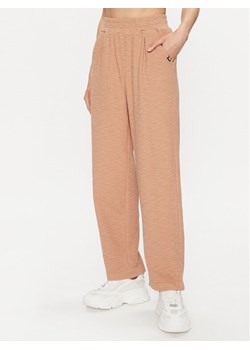 DKNY Sport Spodnie dresowe DP3P3286 Brązowy Regular Fit ze sklepu MODIVO w kategorii Spodnie damskie - zdjęcie 182756858