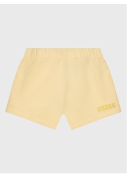 Guess Szorty materiałowe K3GD11 KA6R3 Beżowy Regular Fit ze sklepu MODIVO w kategorii Spodenki dziewczęce - zdjęcie 182759077
