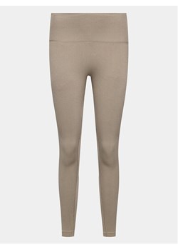 Athlecia Legginsy Aideny W Seamless Rib Tights EA231402 Brązowy Regular Fit ze sklepu MODIVO w kategorii Spodnie damskie - zdjęcie 182759569