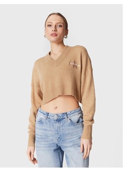 Calvin Klein Jeans Sweter J20J220525 Beżowy Relaxed Fit ze sklepu MODIVO w kategorii Swetry damskie - zdjęcie 182760118