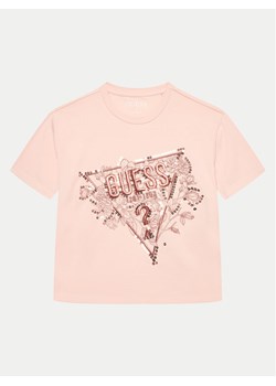 Guess T-Shirt J4YI30 K6YW4 Różowy Boxy Fit ze sklepu MODIVO w kategorii Bluzki dziewczęce - zdjęcie 182760548