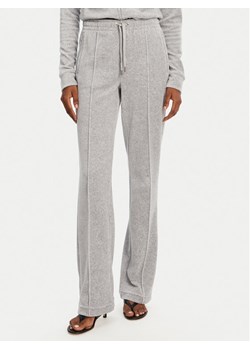 Juicy Couture Spodnie dresowe Tina JCAPW045 Szary Regular Fit ze sklepu MODIVO w kategorii Spodnie damskie - zdjęcie 182761026