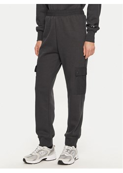 Champion Spodnie dresowe 117499 Szary Regular Fit ze sklepu MODIVO w kategorii Spodnie damskie - zdjęcie 182761775