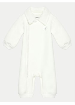 Calvin Klein Jeans Kombinezon zimowy IN0IN00255 Écru Regular Fit ze sklepu MODIVO w kategorii Kombinezony i kurtki - zdjęcie 182761826