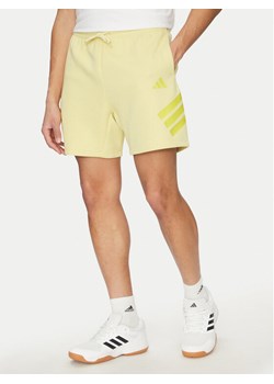 adidas Szorty sportowe Future Icons 3-Stripes JD4883 Żółty Regular Fit ze sklepu MODIVO w kategorii Spodenki męskie - zdjęcie 182761925