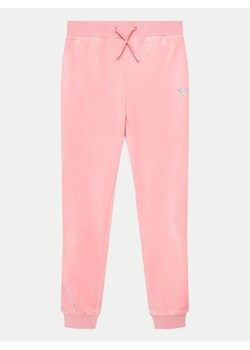 Guess Spodnie dresowe J4YQ20 KBXI2 Różowy Regular Fit ze sklepu MODIVO w kategorii Spodnie dziewczęce - zdjęcie 182762139