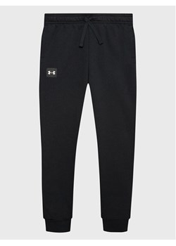 Under Armour Spodnie dresowe Ua Rival 1357628 Czarny Regular Fit ze sklepu MODIVO w kategorii Spodnie chłopięce - zdjęcie 182762515