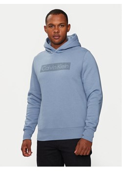 Calvin Klein Bluza Striped Logo K10K113552 Niebieski Regular Fit ze sklepu MODIVO w kategorii Bluzy męskie - zdjęcie 182764066