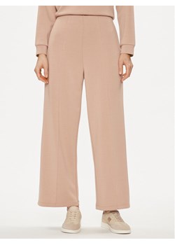 United Colors Of Benetton Spodnie dzianinowe 3UNN3F03B Beżowy Relaxed Fit ze sklepu MODIVO w kategorii Spodnie damskie - zdjęcie 182765266